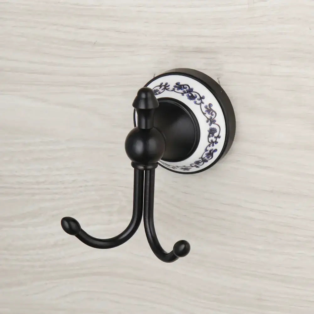 Black stainless steel double hook towel rack with floral white ceramic base for decorbites black stainless bathroom decor