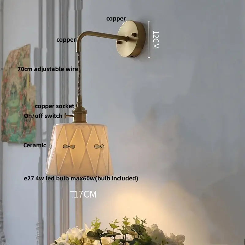 Copper-finished ceramic brass led wall light with diamond facets and bow motifs for bedroom use with switch
