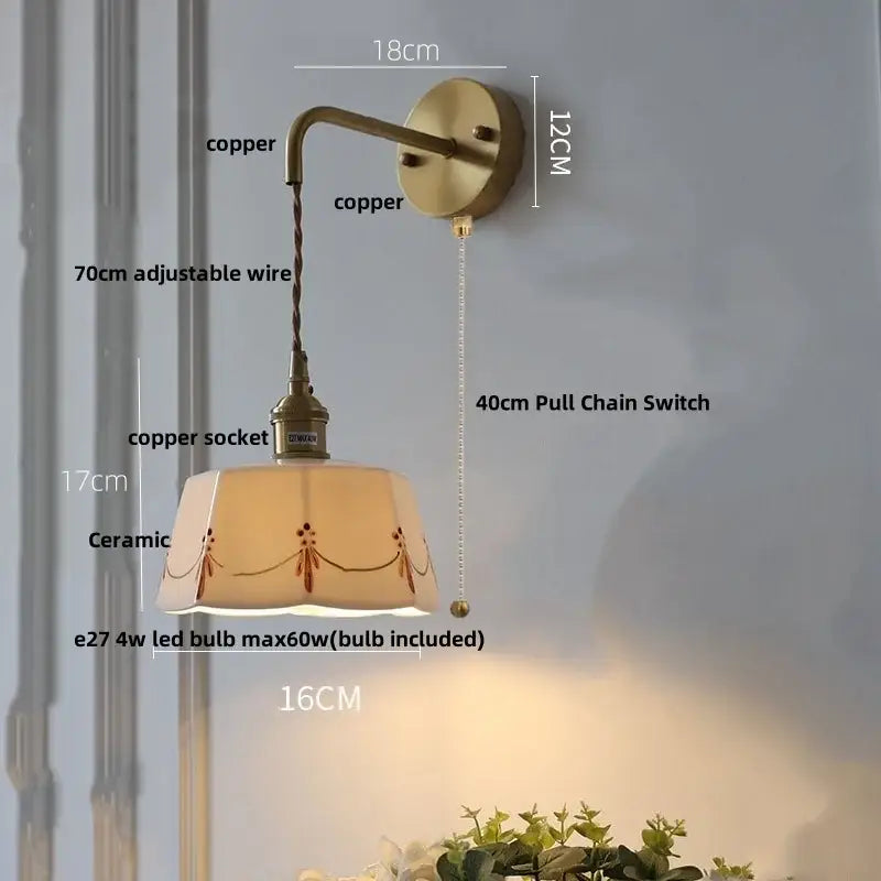 Antique brass led wall light with ceramic shade featuring delicate brown floral patterns for bedroom use