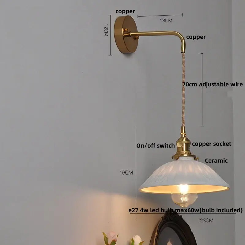 Antique brass led wall light with ceramic frosted shade and adjustable 70cm wire for bedroom use