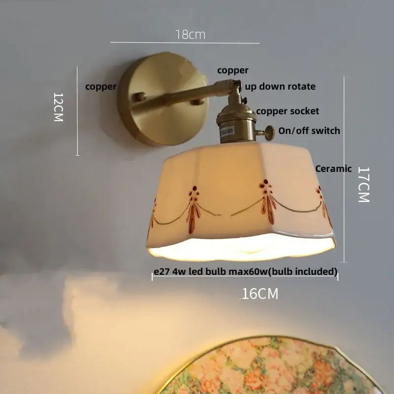 Copper-finished wall light with ceramic brass led shade featuring brown floral embroidery for bedroom use