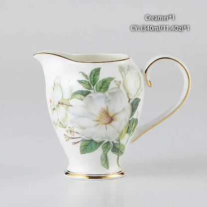 White porcelain creamer with gold trim and white magnolia flowers from decorbites camellia bone china tea set