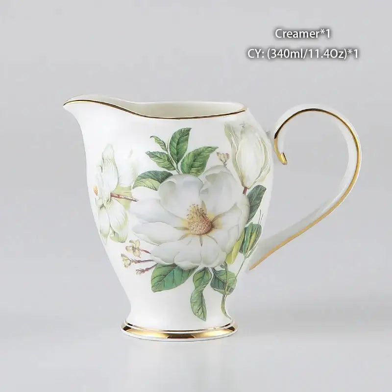 White porcelain creamer with gold trim and white magnolia flowers from decorbites camellia bone china tea set