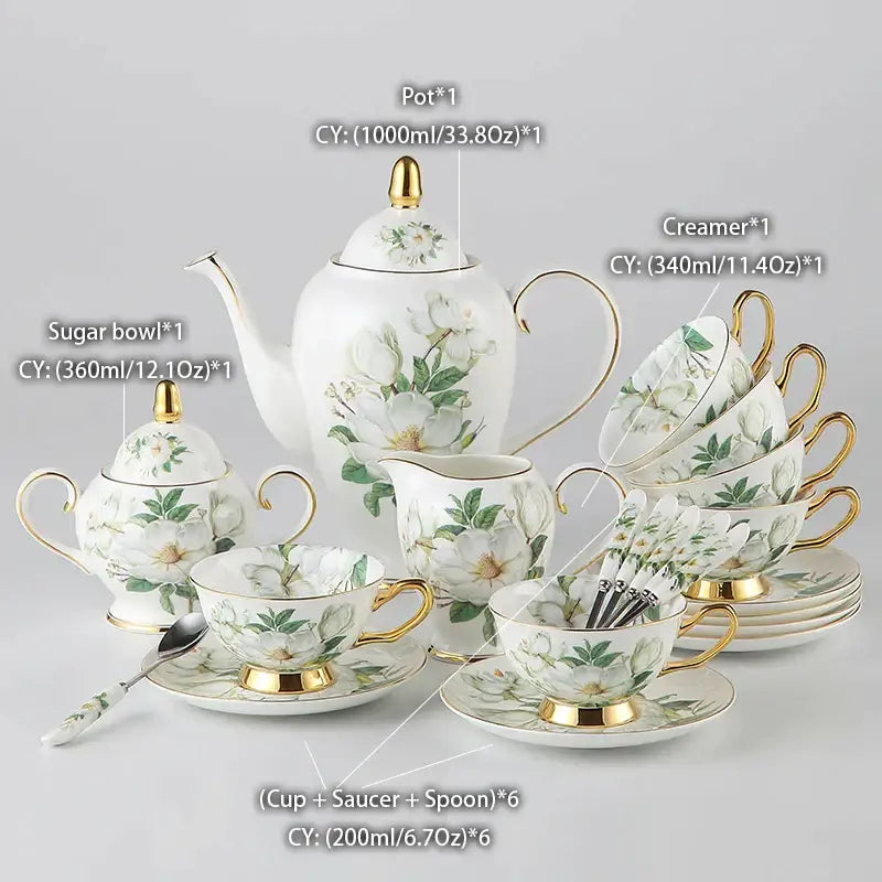 White porcelain floral white camellia bone china tea set with gold accents featuring magnolia flowers and green leaves decorbites camellia bone