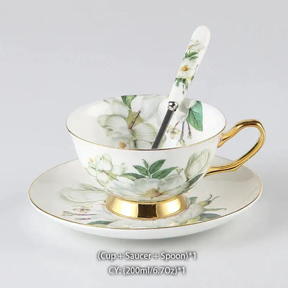 Elegant white porcelain teacup and saucer with gold trim and floral patterns in decorbites camellia bone china set