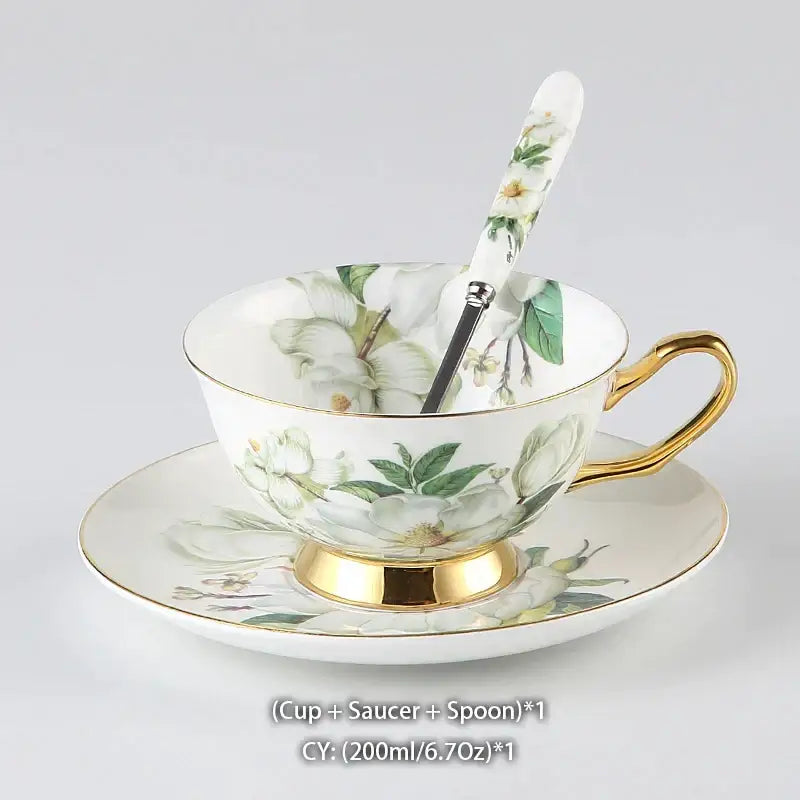 Elegant white porcelain teacup and saucer with gold trim and floral patterns in decorbites camellia bone china set