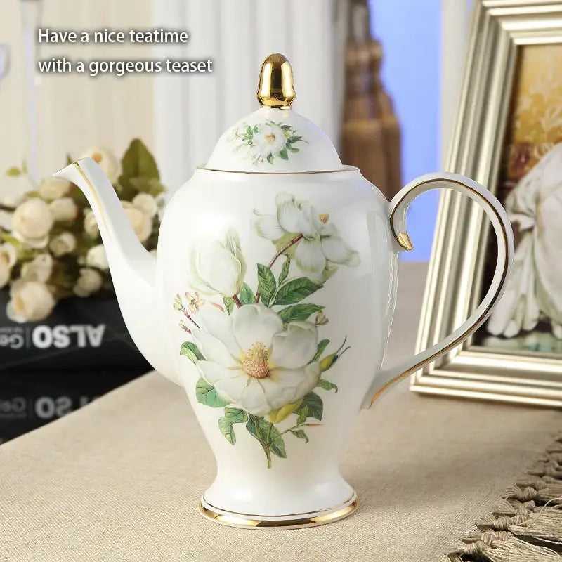 White porcelain teapot with gold trim and magnolia blossoms from decorbites camellia bone china tea set