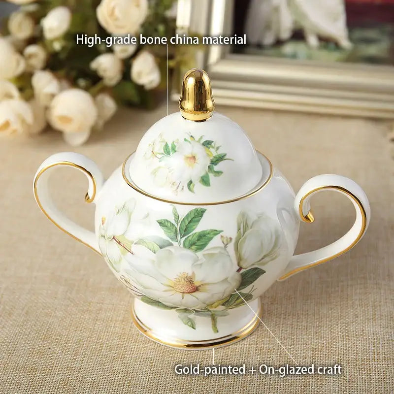 White porcelain sugar bowl with gold-trimmed handles and floral patterns from decorbites camellia bone china tea set