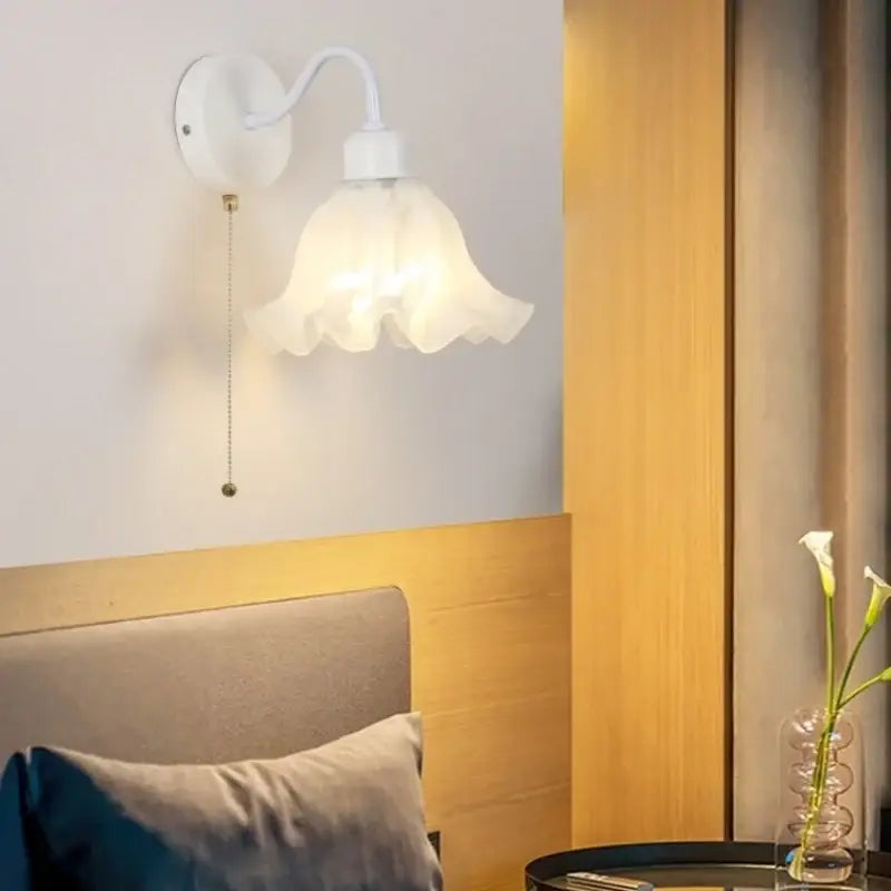 White wall sconce with ruffled floral glass shade and curved iron arm decorbites glass iron led for bedroom decor