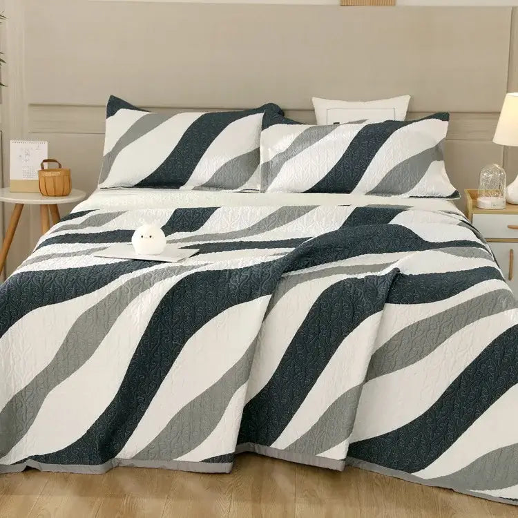 A quilted cotton double bedspread set with bold navy blue gray and white diagonal stripes for bedroom decorbites decor