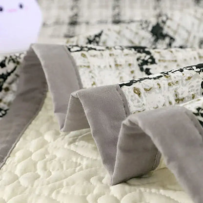 Soft quilted cotton double bedspread set with black and gold floral pattern and gray velvet edge for decorbites decor