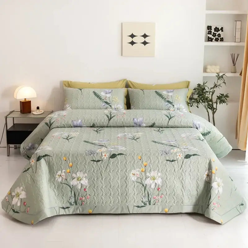 Soft sage green cotton quilted bed cover set with delicate white purple and yellow floral pattern for bedroom use