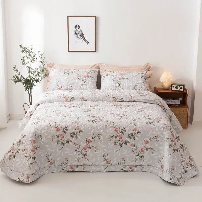 Floral white and green quilted cotton bed cover set featuring a soft light gray bedspread with pink and green floral pattern