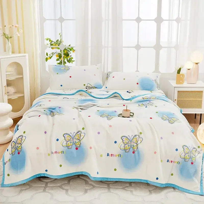 Floral white and navy cozy flannel plush blanket with white butterfly quilting and colorful polka dots for bedroom decorbites cozy flannel