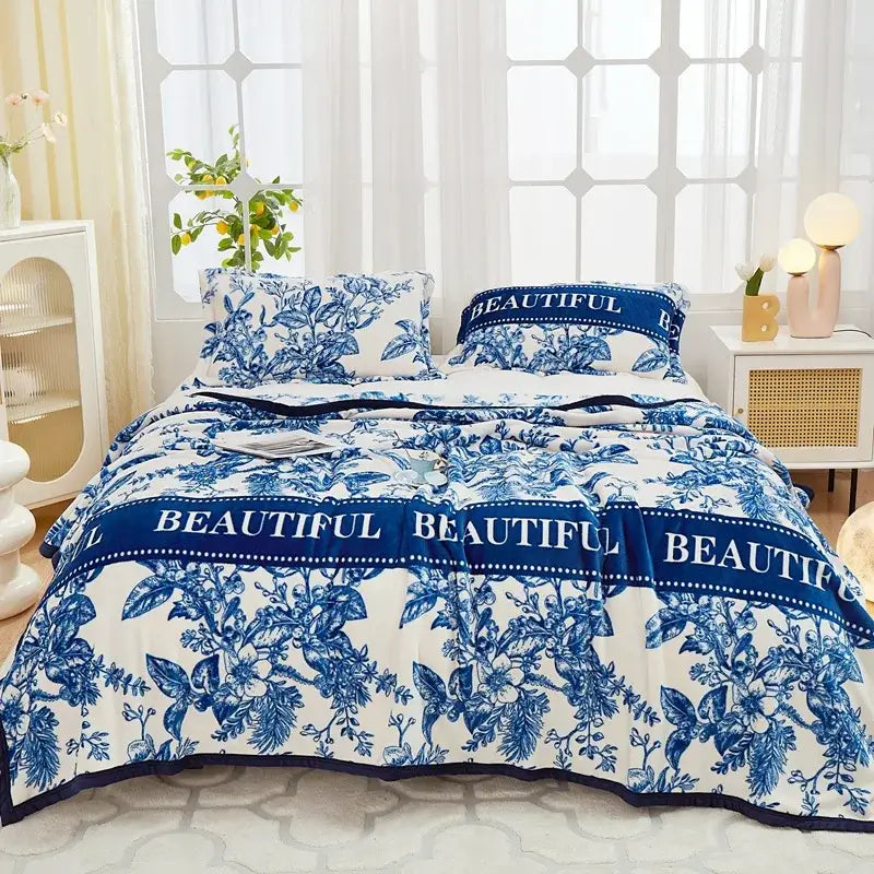 Blue and white floral patterned bedding set with beautiful text bands made of decorbites cozy flannel plush material