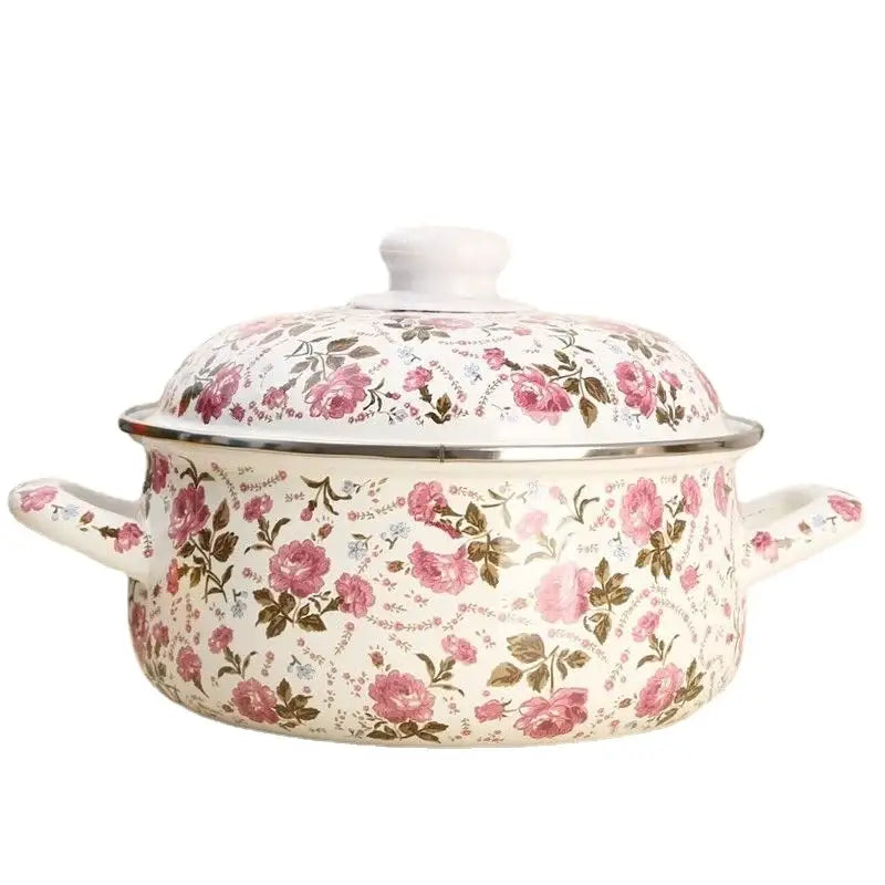 A white enamel ceramics soup saucepan with lid featuring a pink and brown floral pattern for kitchen use