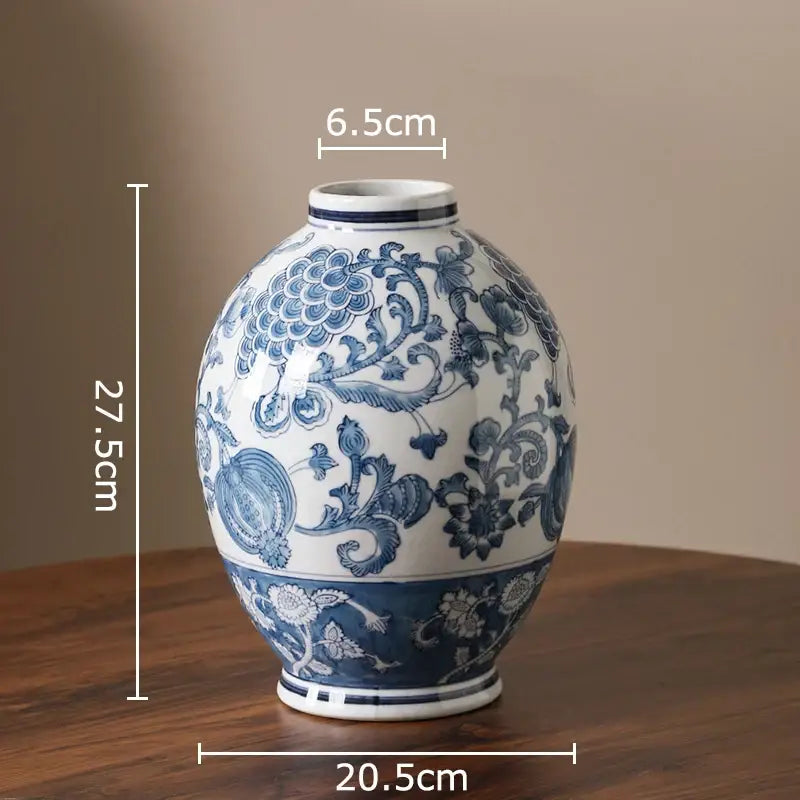A classic blue and white porcelain vase with intricate floral patterns for living room decor featuring white porcelain elements