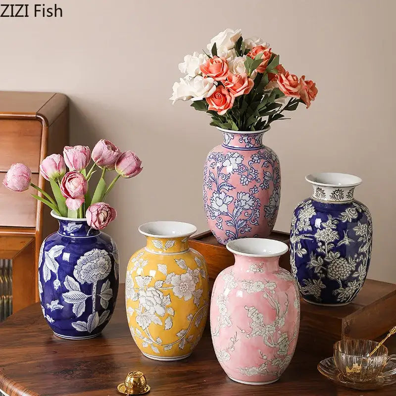 A collection of vibrant blue yellow pink porcelain vases with intricate white floral patterns for living room decor