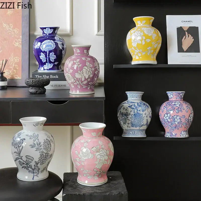 A pink porcelain vase with white floral patterns and glossy finish for living room decor