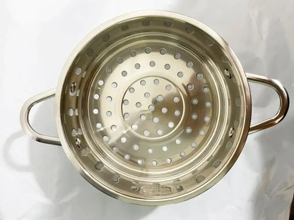 Shiny stainless steel steamer basket with two handles and circular holes for use with flower edged baby food pot set