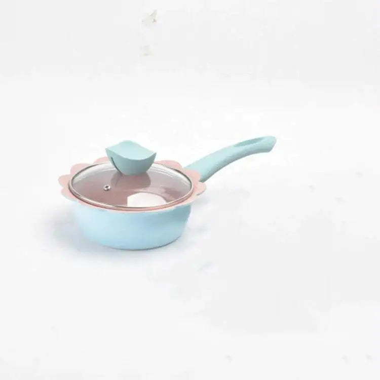 Pastel blue baby food pot with pink scalloped rim and matching lid handle from flower edged cookware set