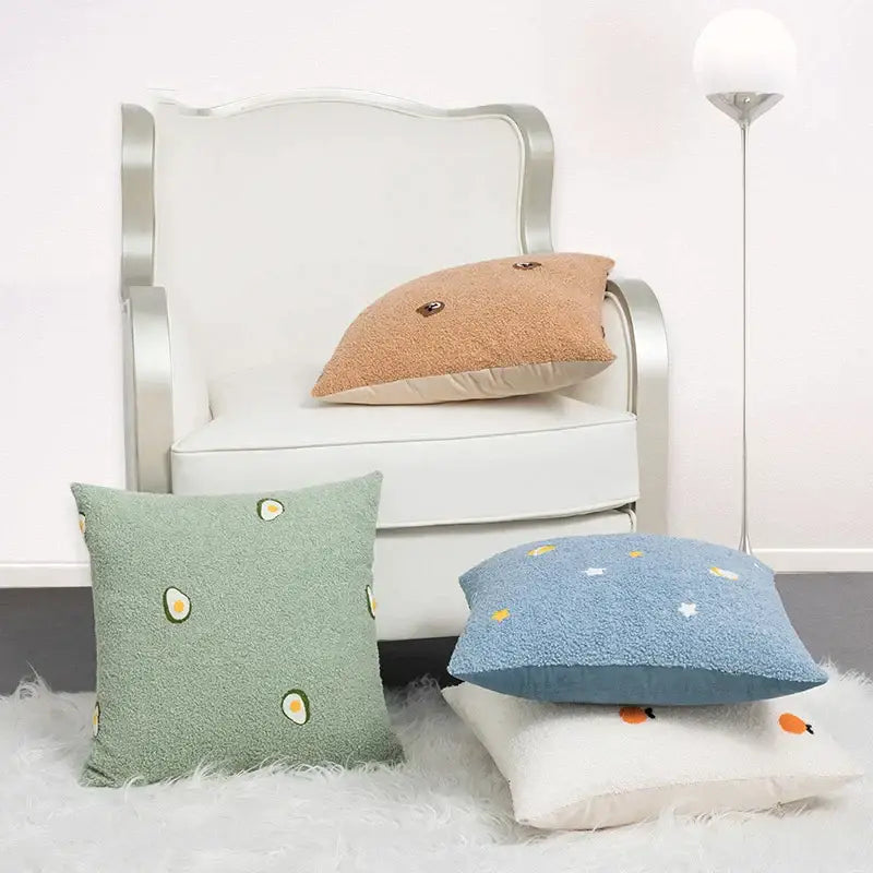 Soft mint green fluffy comfort pillow cover with embroidered egg designs for avocado green and white living room decor