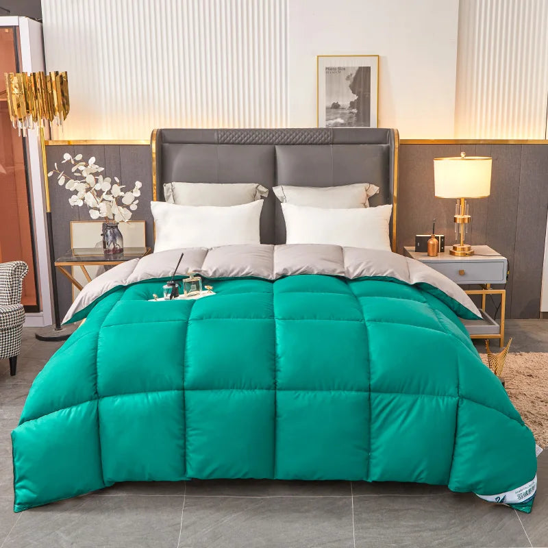 Vibrant teal quilted comforter with plush soft texture and square stitching pattern featuring quilt code design