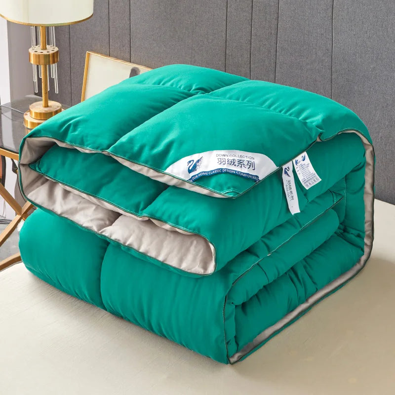 Teal quilted down comforter with plush texture and beige lining, lightweight warm winter quilt code blanket