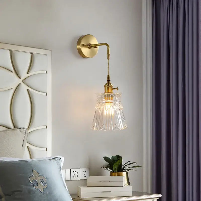 A brass glass led wall sconce with a clear fluted glass shade for bedroom decorbites brass glass lighting