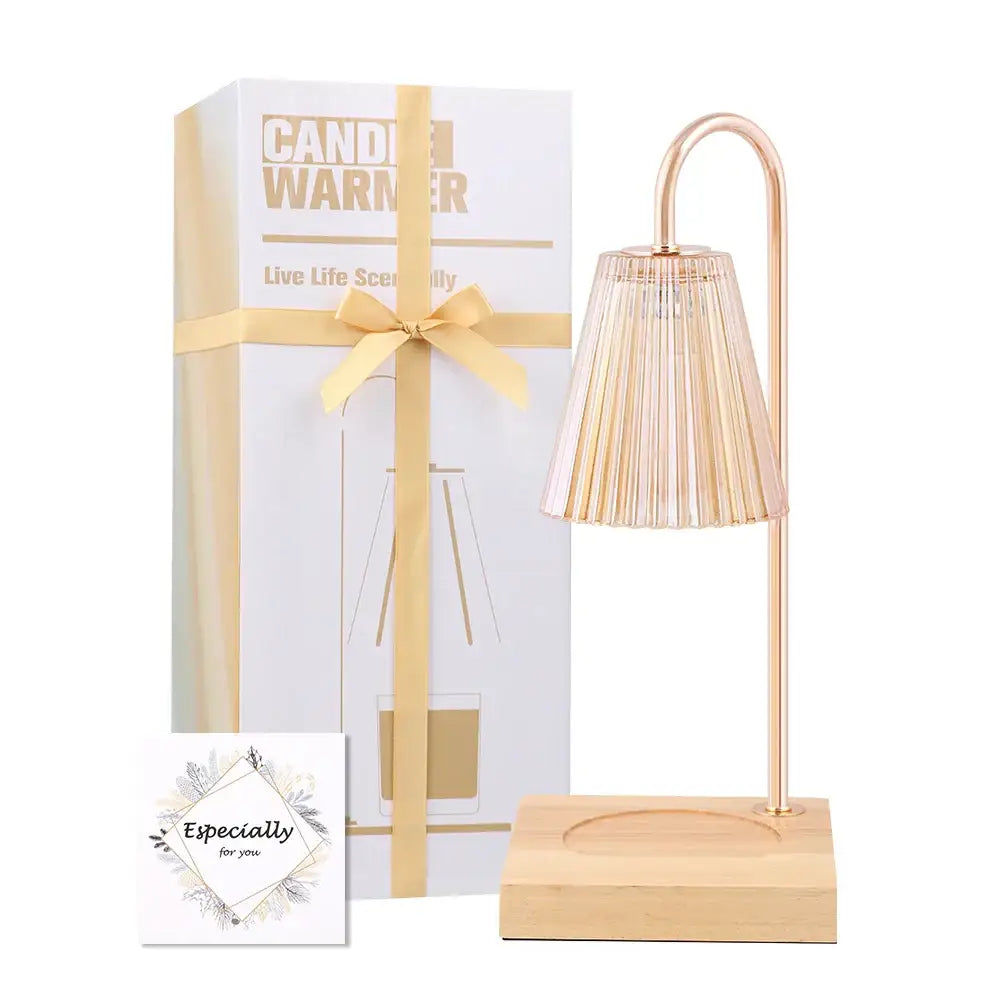 Rose gold candle warmer with a pleated fluted glass shade and wooden base for decorbites gold wax melting decor