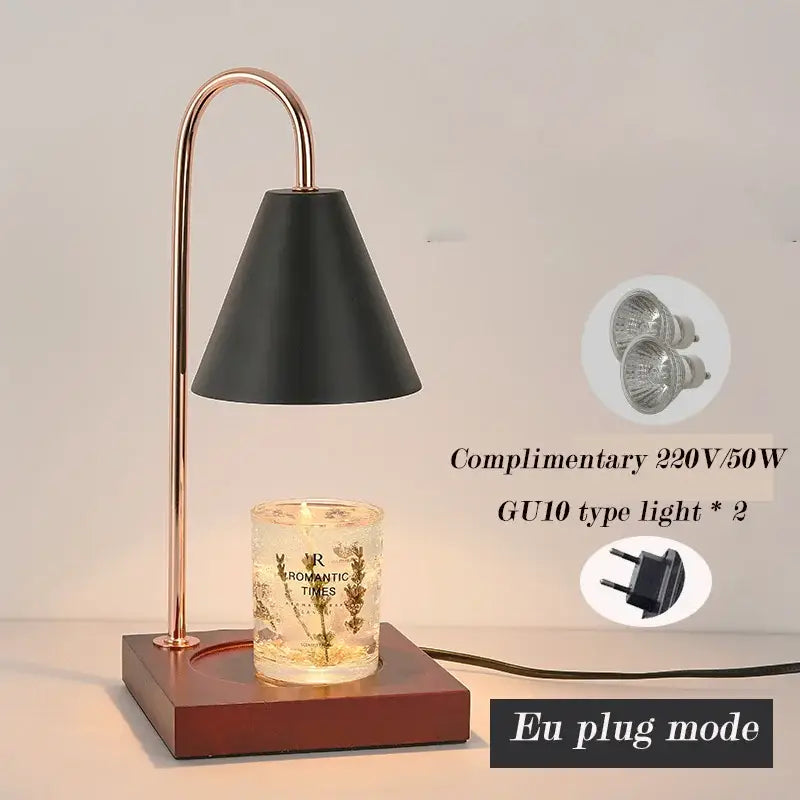 A sleek black conical candle warmer with rose gold curved stand designed for decorbites gold wax melting