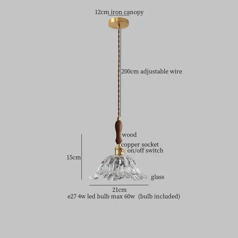 Fluted glass led pendant lamp with brass accents featuring a clear fluted glass pendant and copper wire for dining room lighting