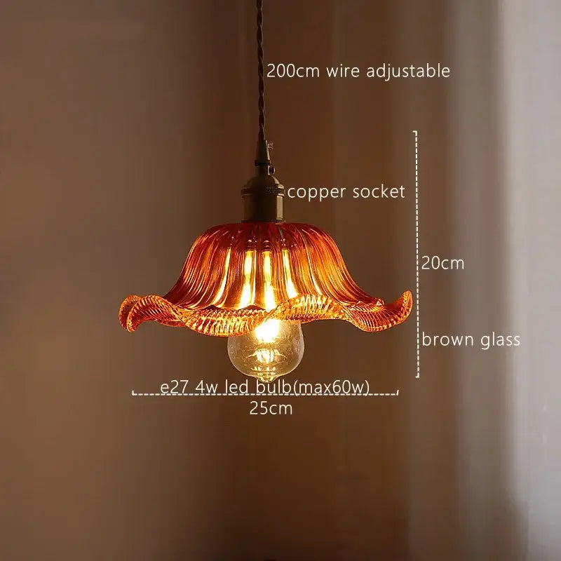 Warm amber pendant light with fluted petal design and copper socket for decorbites green stripe glass kitchen fixture