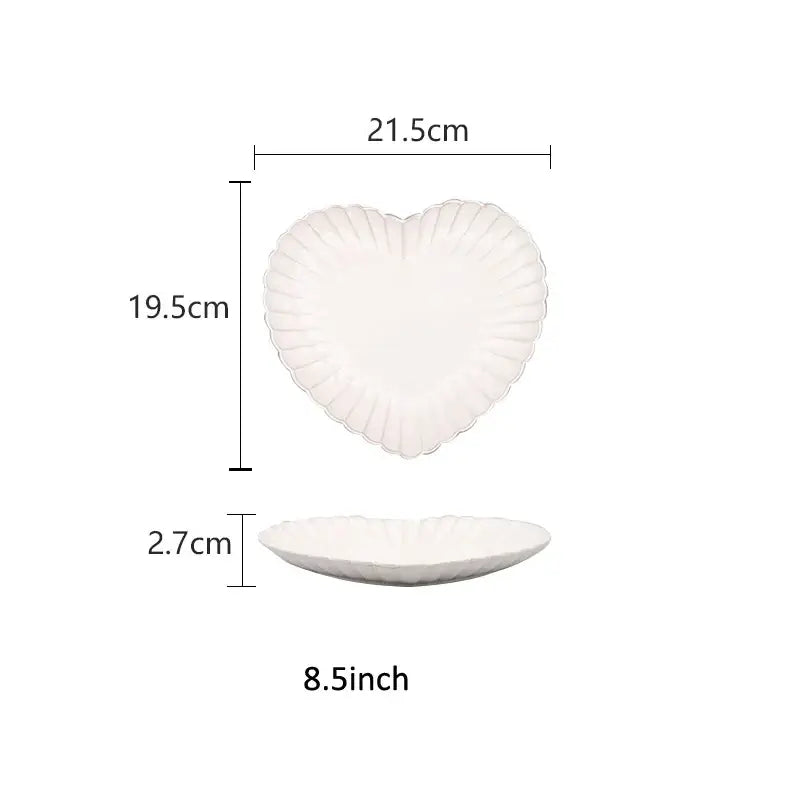 White ceramic heart-shaped plate with scalloped edge and fluted design from decorbites ceramic white dinnerware set