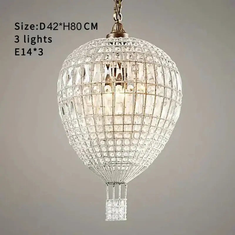 French balloon crystal pendant light featuring clear faceted crystals with a brass-finished metal frame for luxury decorbites pendant lights