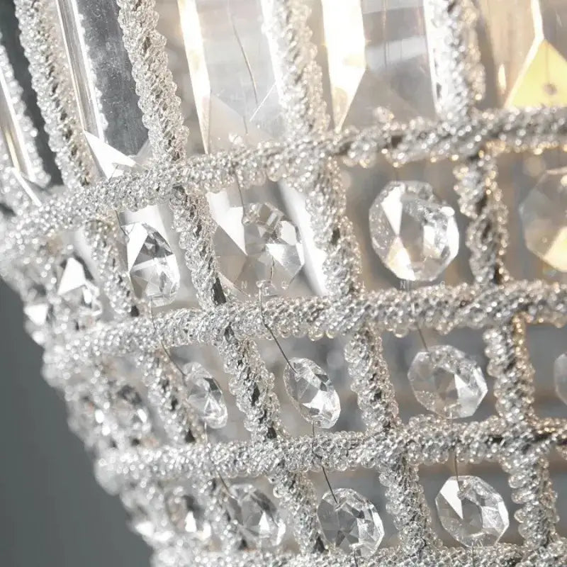 A sparkling silver beaded pendant light with faceted crystal droplets and clear glass prisms for luxury decorbites french balloon decor