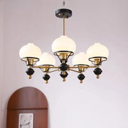 A french bauhaus ceiling chandelier with five frosted glass globes black and brass accents by decorbites