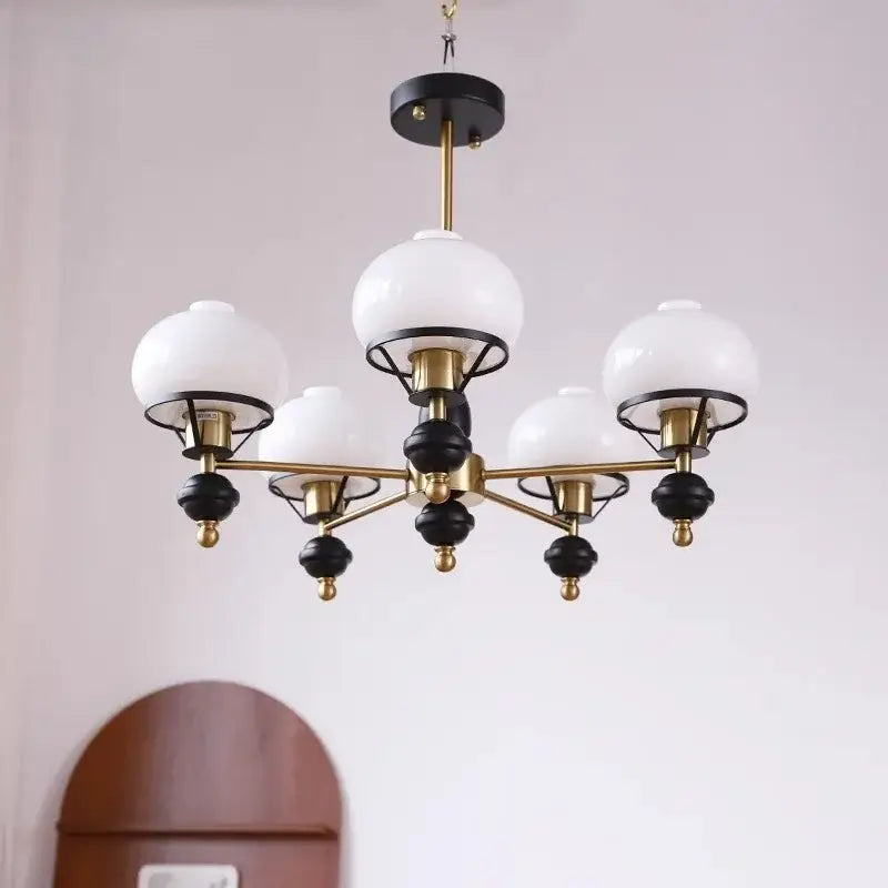 French Bauhaus ceiling chandelier with five frosted white glass globes and black brass metal arms by Decorbites