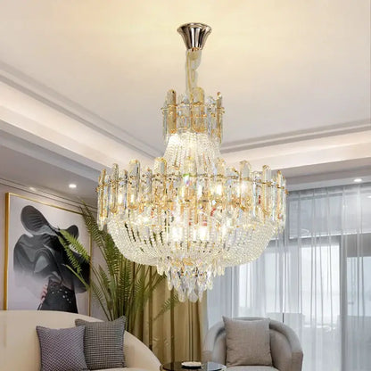 A multi-tiered french bead chain crystal chandelier with gold tone accents and polished chrome mount for dining room decorbites french bead