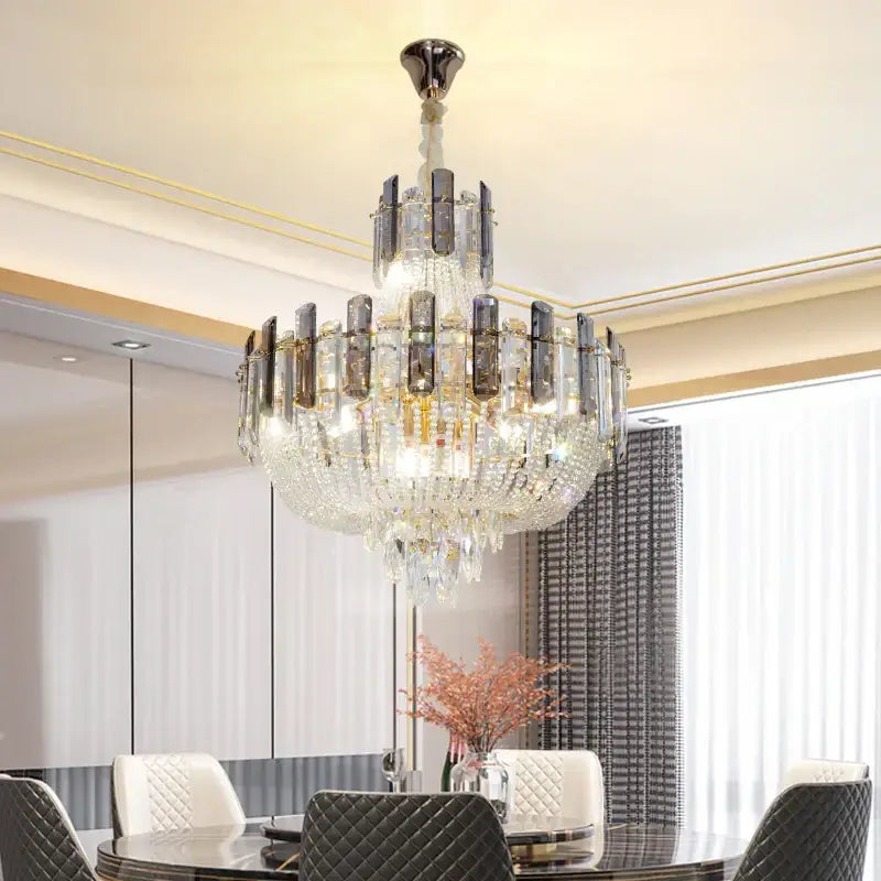 A french bead chain crystal chandelier with clear and smoky glass prisms in gold and chrome for dining room decorbites french bead
