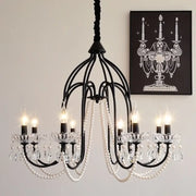 Black e14 candle chandelier with wrought iron frame crystal accents and pearl strands for living room decorbites black e14