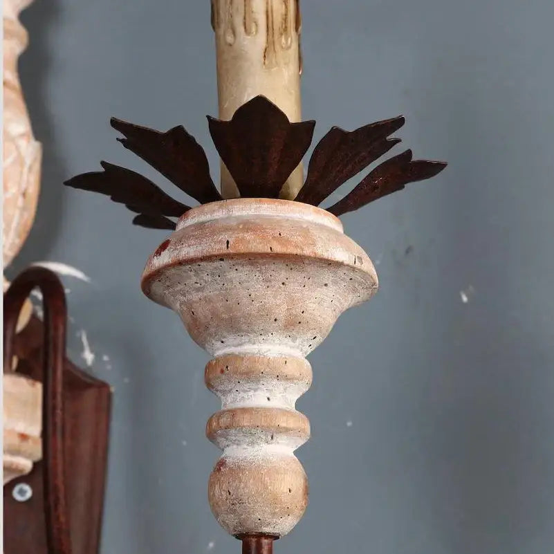 French country distressed white antique retro wall sconces with wood base and rusted metal leaf accents featuring aged candle