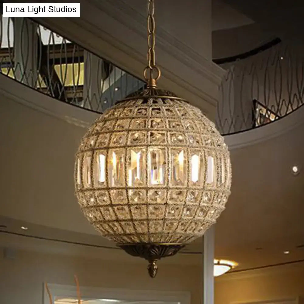 DecorBites™ french country globe pendant chandelier with crystal shade and brass finish featuring geometric cuttings