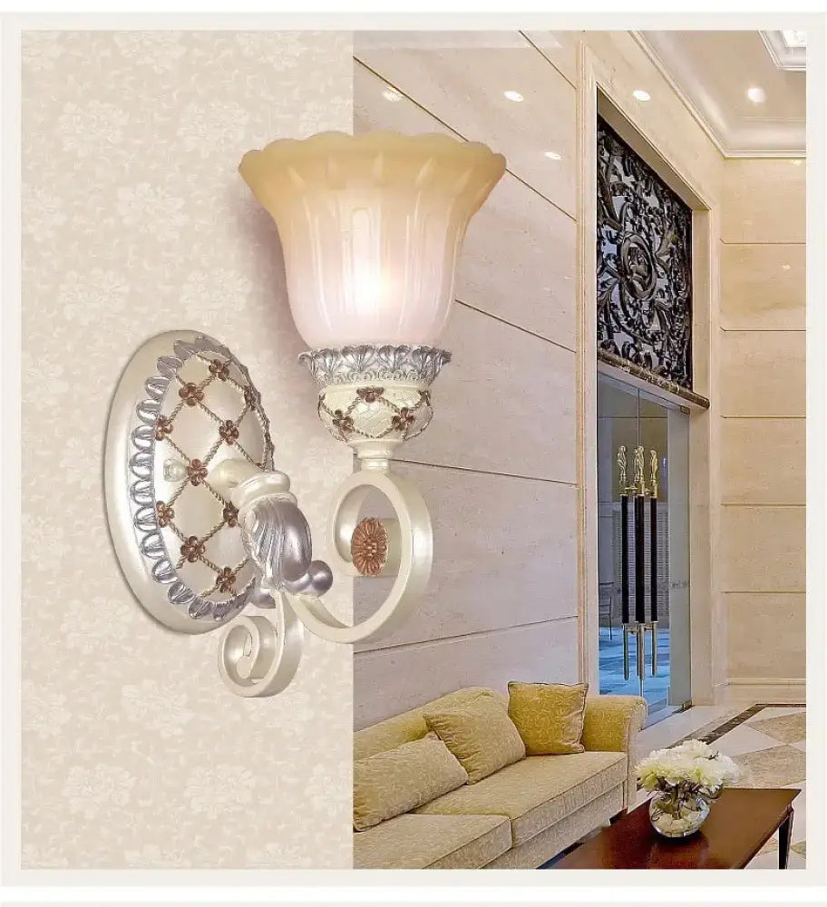 French country gold wall sconce with opaline glass shade and ornate silver metalwork featuring floral patterns for living room