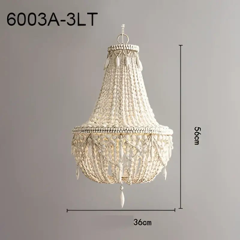 Beige french country wood bead chandelier with intricate woven design and dangling teardrop accents for bedroom or dining room