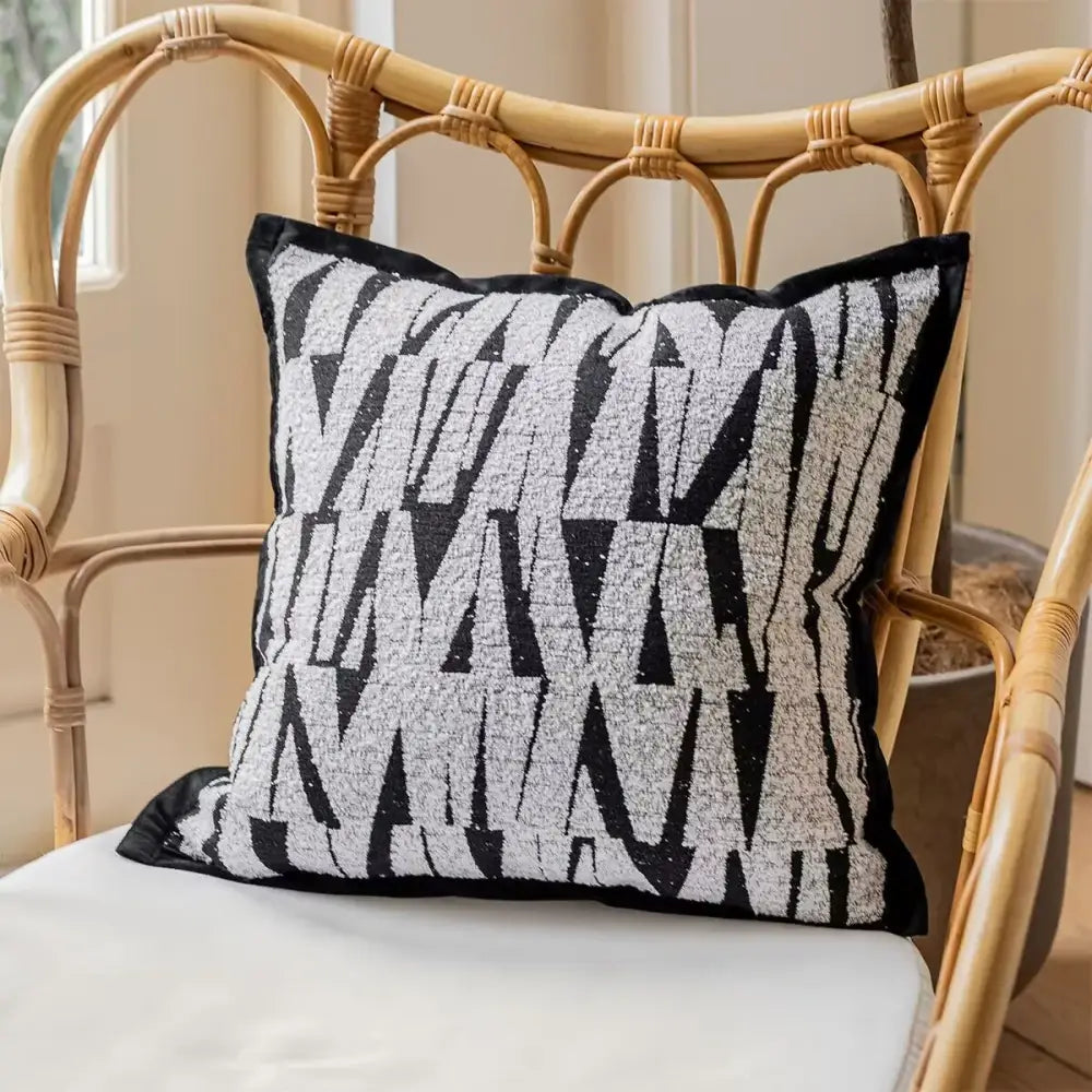 Black and silver geometric patterned cushion cover with textured sequined finish for decorbites french cream bubble decor