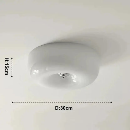 A sleek french cream ceiling lamp with a smooth glass dome and chrome hardware for bedroom decorbites french cream lighting