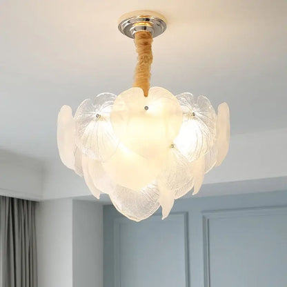 A decorbites french cream crystal living room chandelier with white petal glass shades and wooden-textured rod
