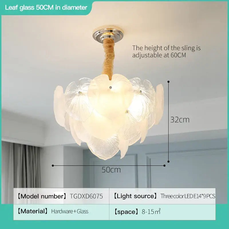 French cream crystal chandelier featuring delicate white leaf-shaped glass petals and a gold-toned adjustable fixture