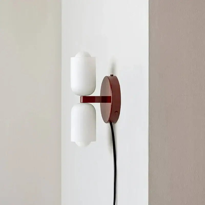 Modern french cream double headed brass wall lamp with frosted glass shades on matte red metal arm for bedroom decorbites french cream